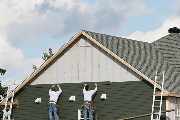 Professional Emergency Siding Repair technician working in Tolland, CT